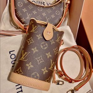 Louis Vuitton FOLD ME Pouch crossbody bag